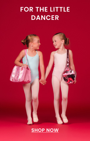 Two young dancers holding hands